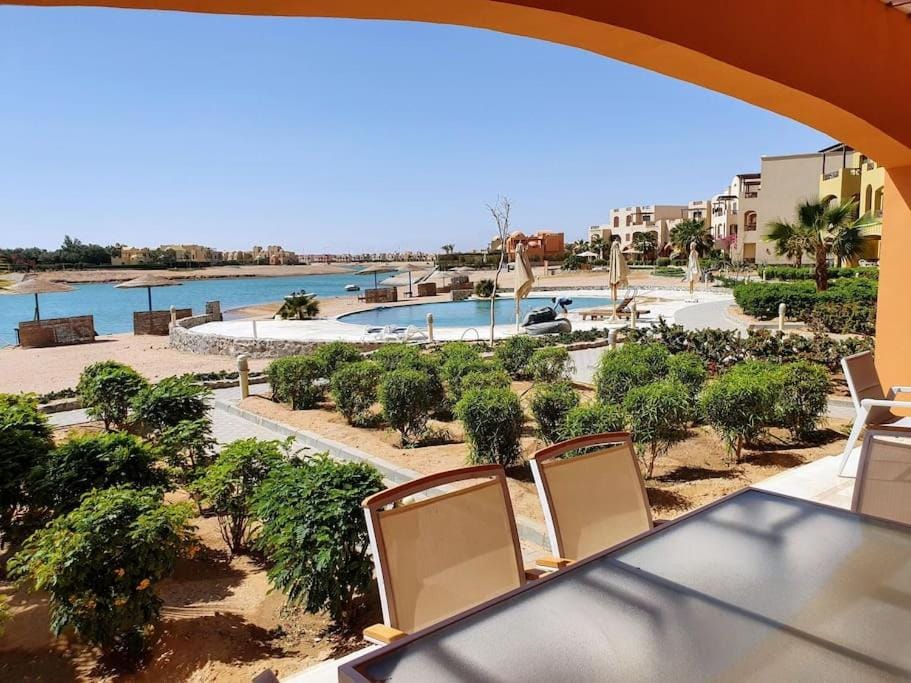 Patio, Day, Natural landscape, Beach, Lake view, Pool view, Swimming pool