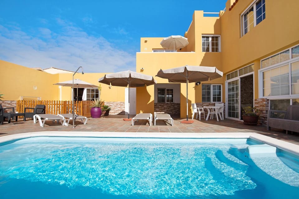 Property building, Living room, Swimming pool