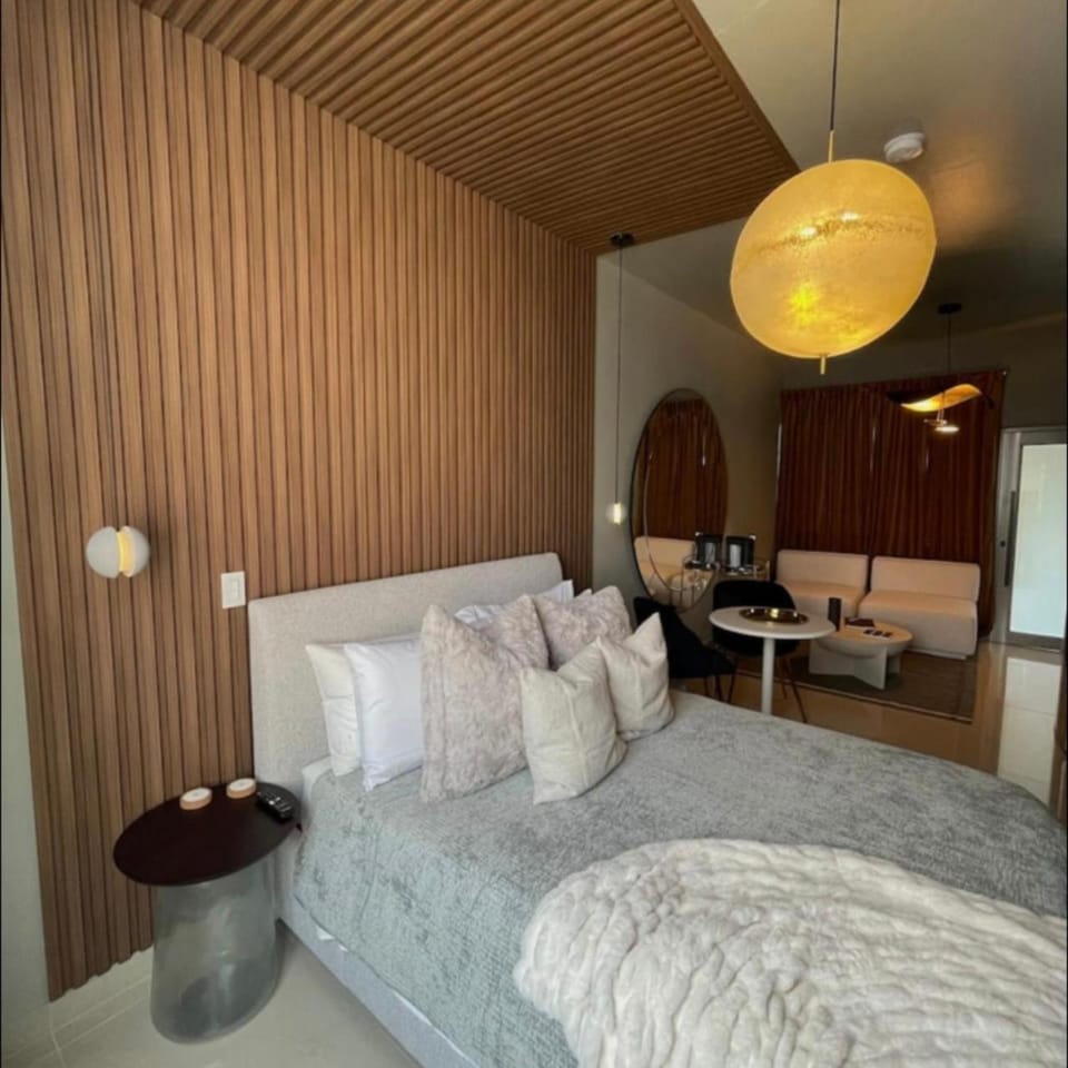 Bed, Living room, Photo of the whole room, Seating area, Bedroom