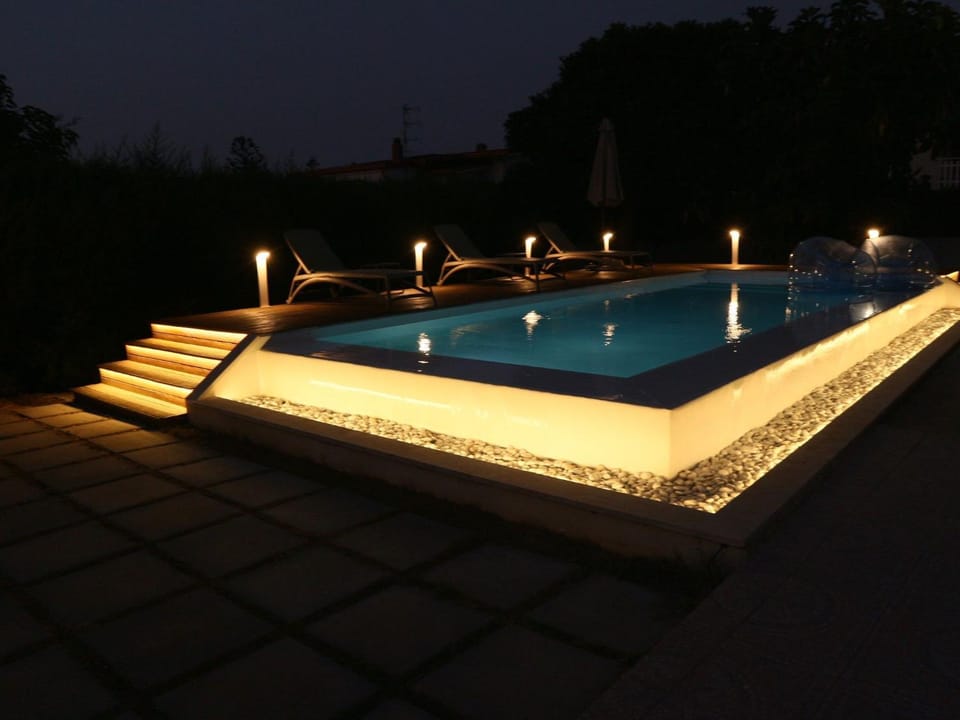 Property building, Living room, Swimming pool
