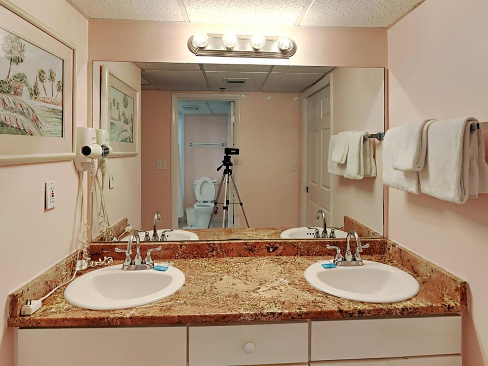 Toilet, Bathroom, hair dryier, towels