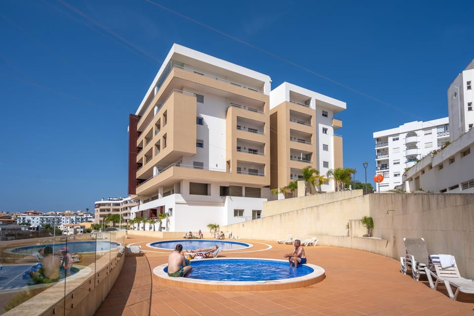 Property building, Living room, Swimming pool