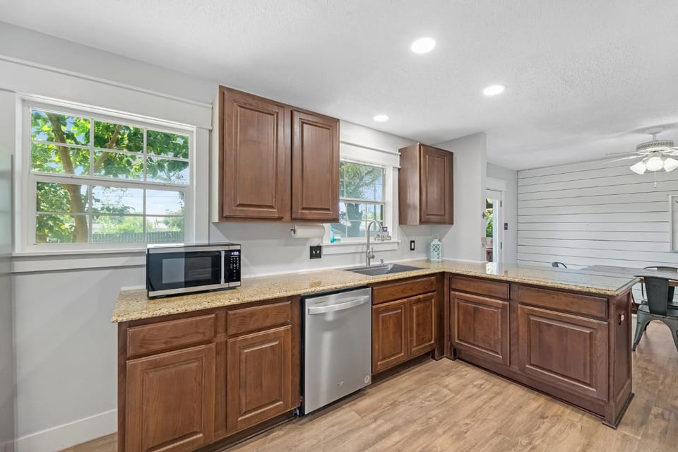 Dining area, dishwasher, microwave, oven, stove, kitchen