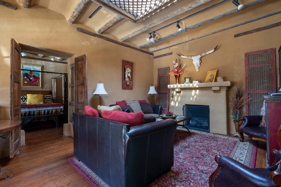 Bed, Living room, Seating area, Bedroom, fireplace, furniture