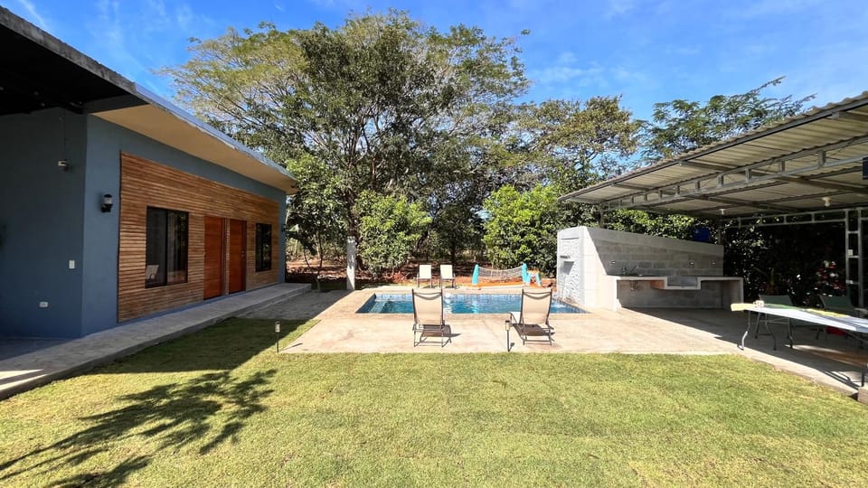 Property building, Patio, Natural landscape, Garden, Garden view, Pool view, Swimming pool