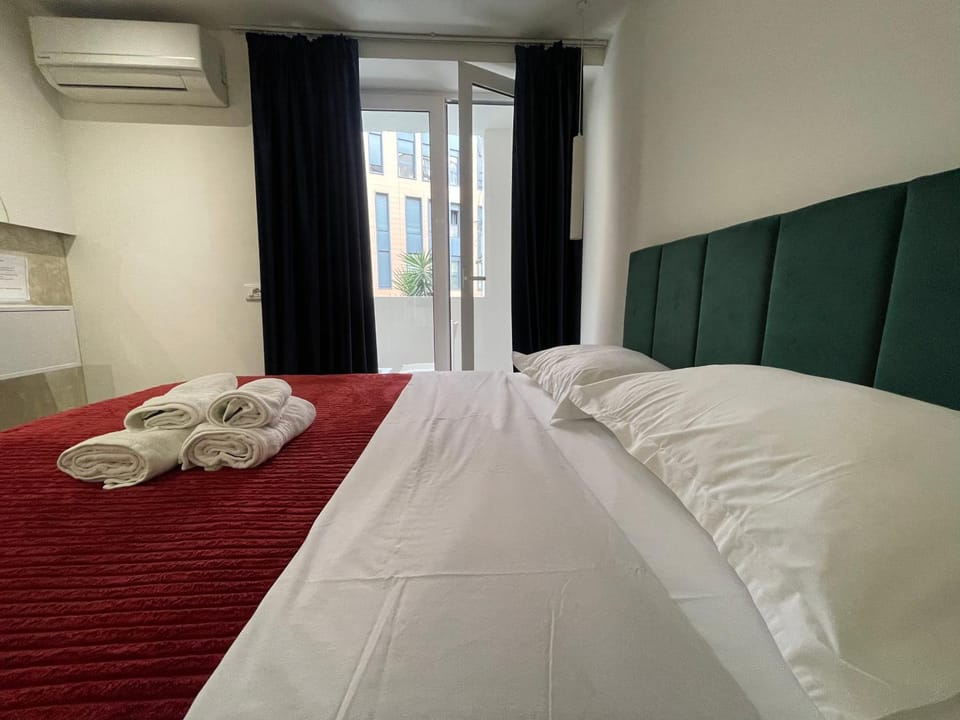 Bed, Photo of the whole room, Bedroom, towels, air conditioner