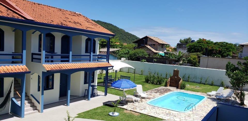 Property building, Patio, Day, Pool view, Swimming pool, Inner courtyard view