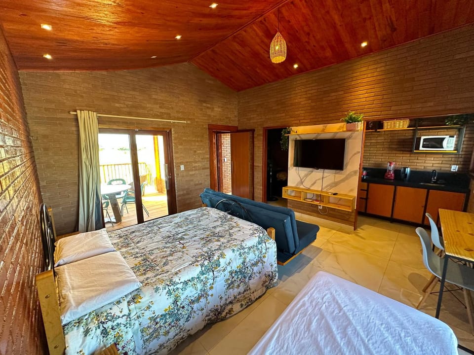 Communal lounge/ TV room, Bed, TV and multimedia, Kitchen or kitchenette, Living room, Photo of the whole room, Seating area, Dining area, Evening entertainment, Bedroom, minibar