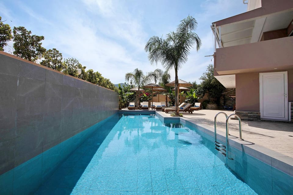 Property building, Living room, Swimming pool