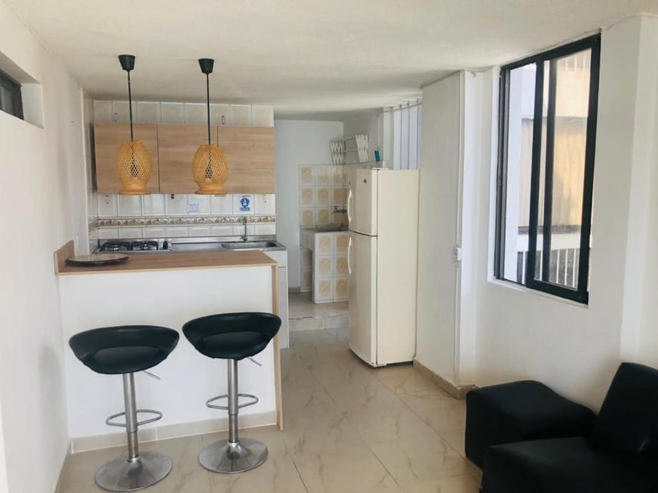 Kitchen or kitchenette, minibar