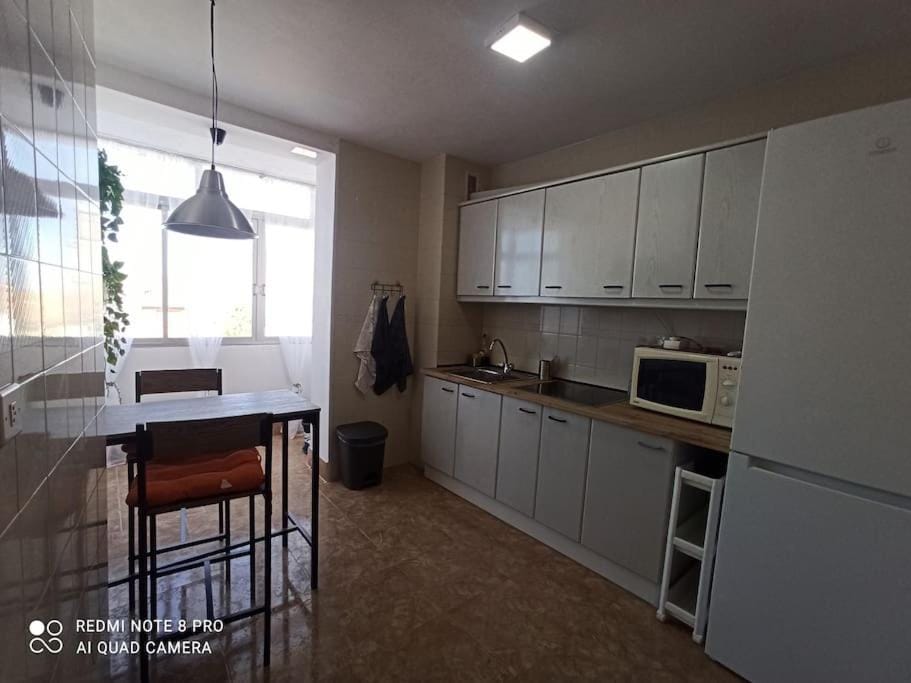 Balcony/Terrace, Balcony/Terrace, Kitchen or kitchenette, Dining area, furniture, minibar, stove, toaster, washing machine