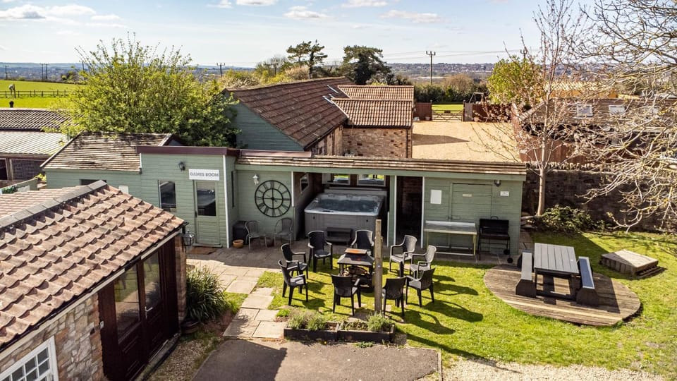The Farmhouse with two hot tubs House in Bristol