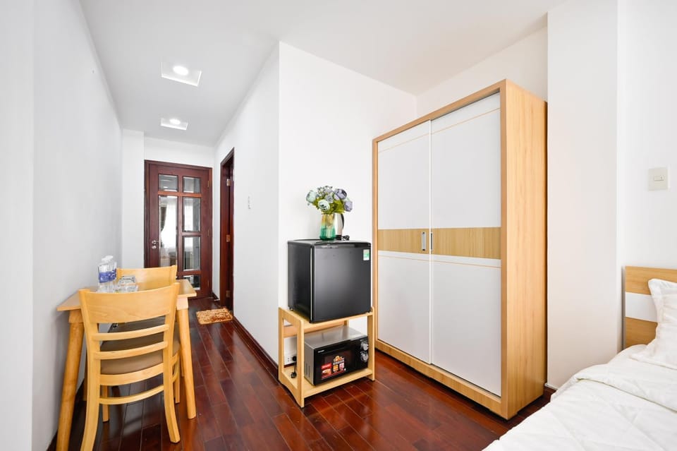 Seating area, minibar, wardrobe