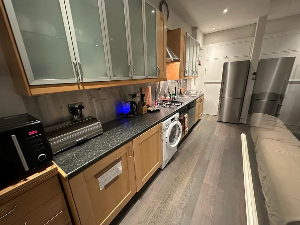 Kitchen or kitchenette, dishwasher, oven, stove, toaster