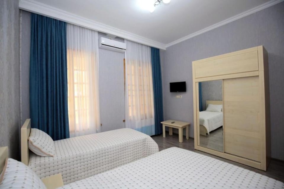 Communal lounge/ TV room, Bed, TV and multimedia, Photo of the whole room, Evening entertainment, Bedroom, hair dresser, wardrobe, air conditioner
