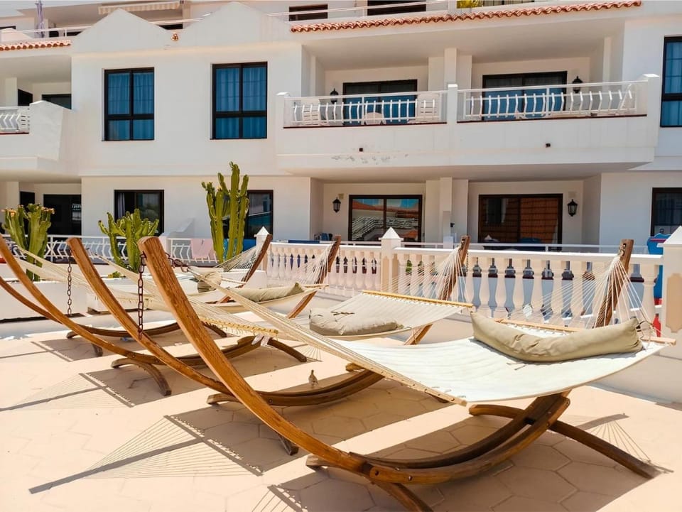 Property building, Day, View (from property/room), Pool view, Swimming pool, sunbed