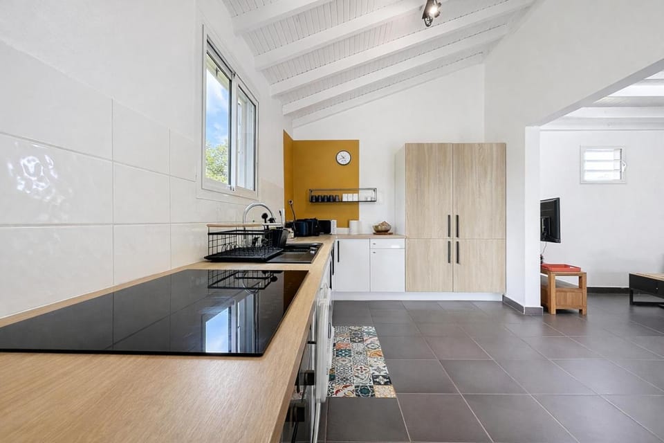 Kitchen or kitchenette, dishwasher, oven, stove