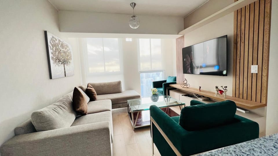 TV and multimedia, Living room, Dining area, furniture, microwave, towels, wardrobe, washing machine