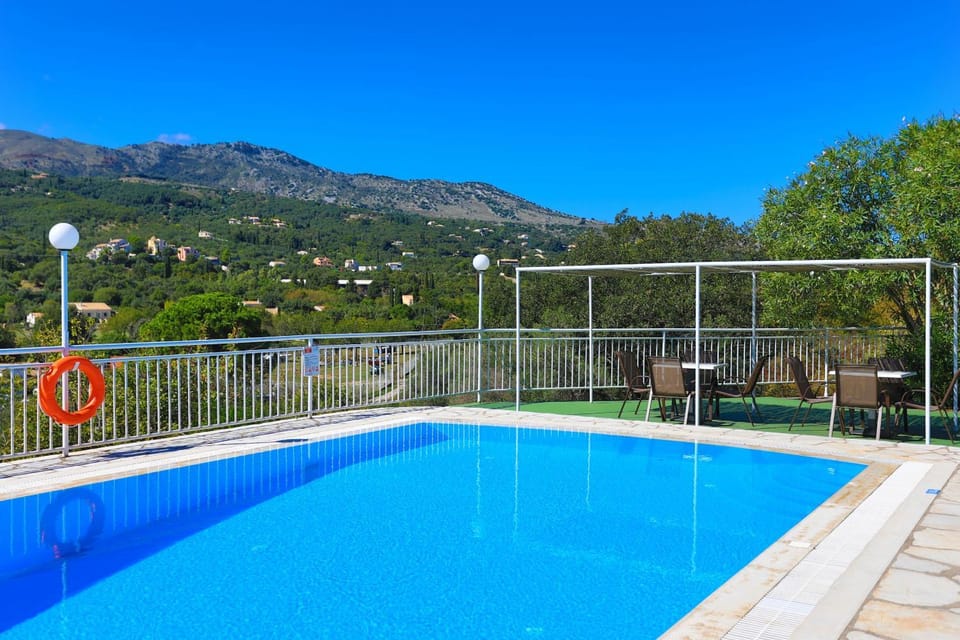 Day, Natural landscape, Seating area, Mountain view, Pool view, Swimming pool