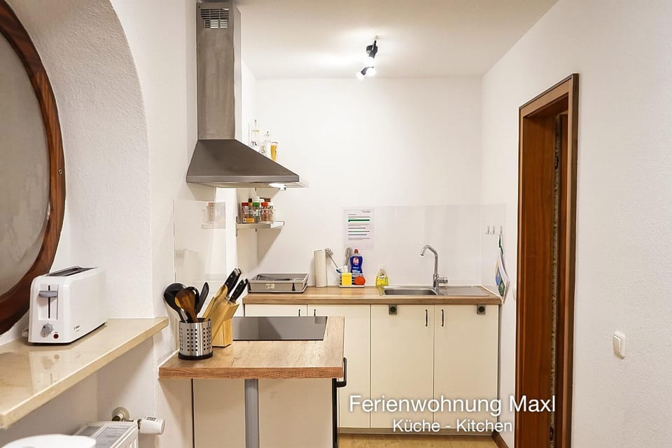 Kitchen or kitchenette, stove, kitchen