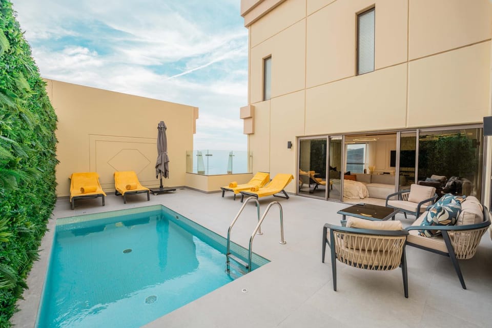 Property building, Patio, Seating area, Swimming pool, sunbed