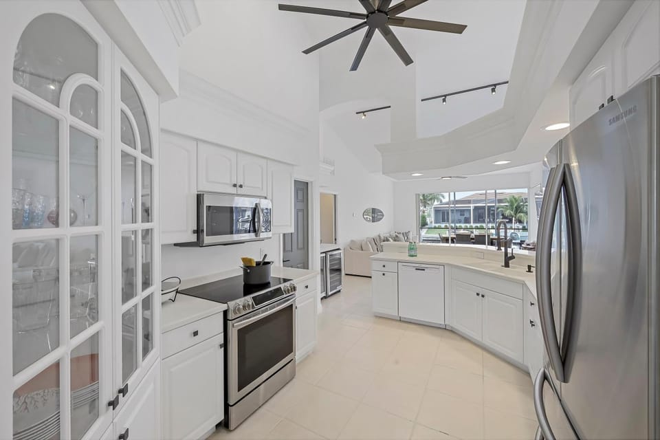 Waterfront oasis with pool, kayaks and steps to beach House in Marco Island