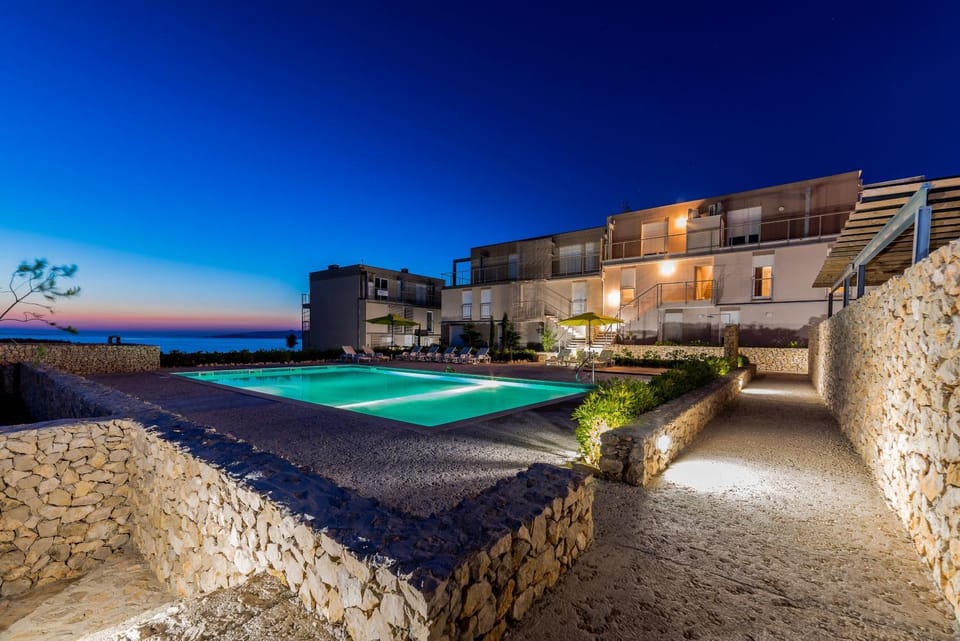 Property building, Night, Natural landscape, Pool view, Sea view, Swimming pool