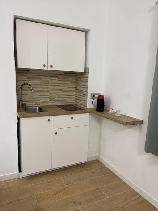 Kitchen or kitchenette, stove