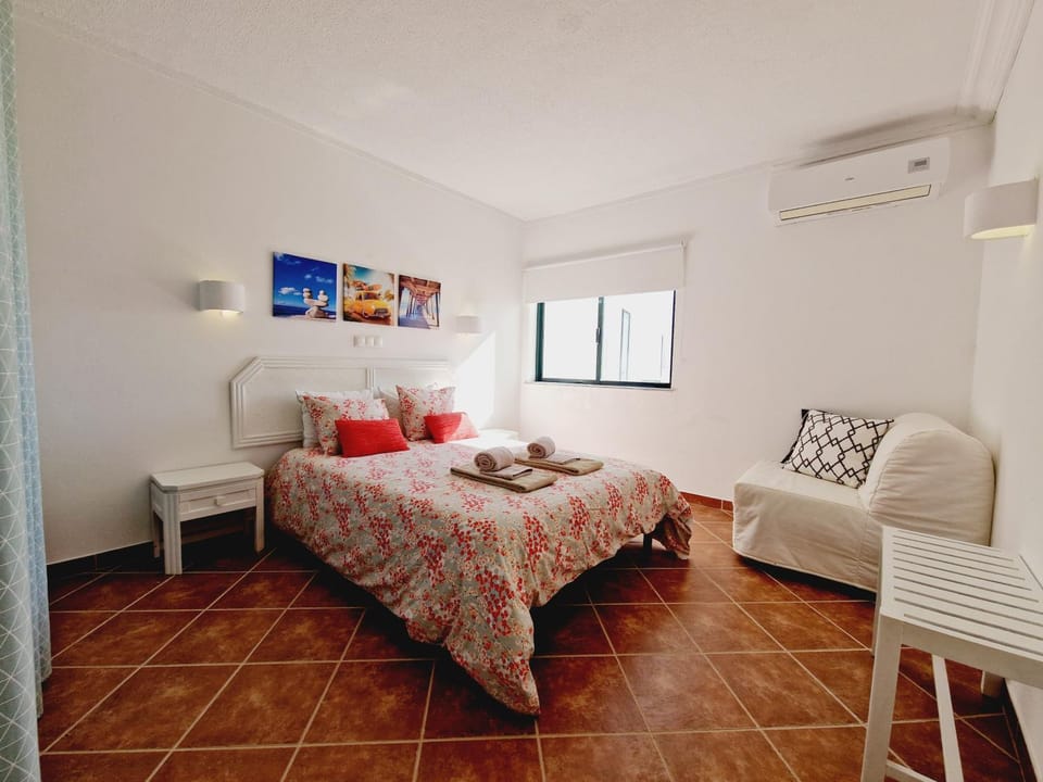 Bed, Photo of the whole room, Bedroom, towels, air conditioner