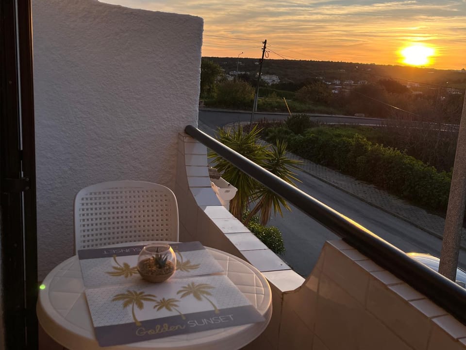 View (from property/room), Balcony/Terrace, Dining area, Sunset