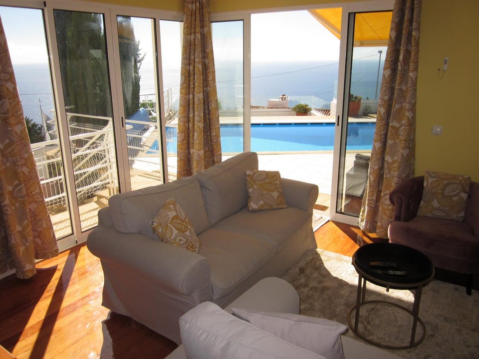 Living room, Pool view, Sea view, Swimming pool