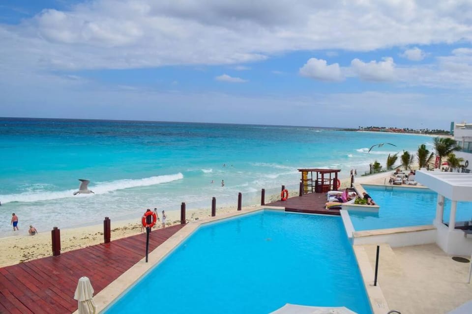 Day, Natural landscape, Beach, Pool view, Sea view, Swimming pool, sunbed