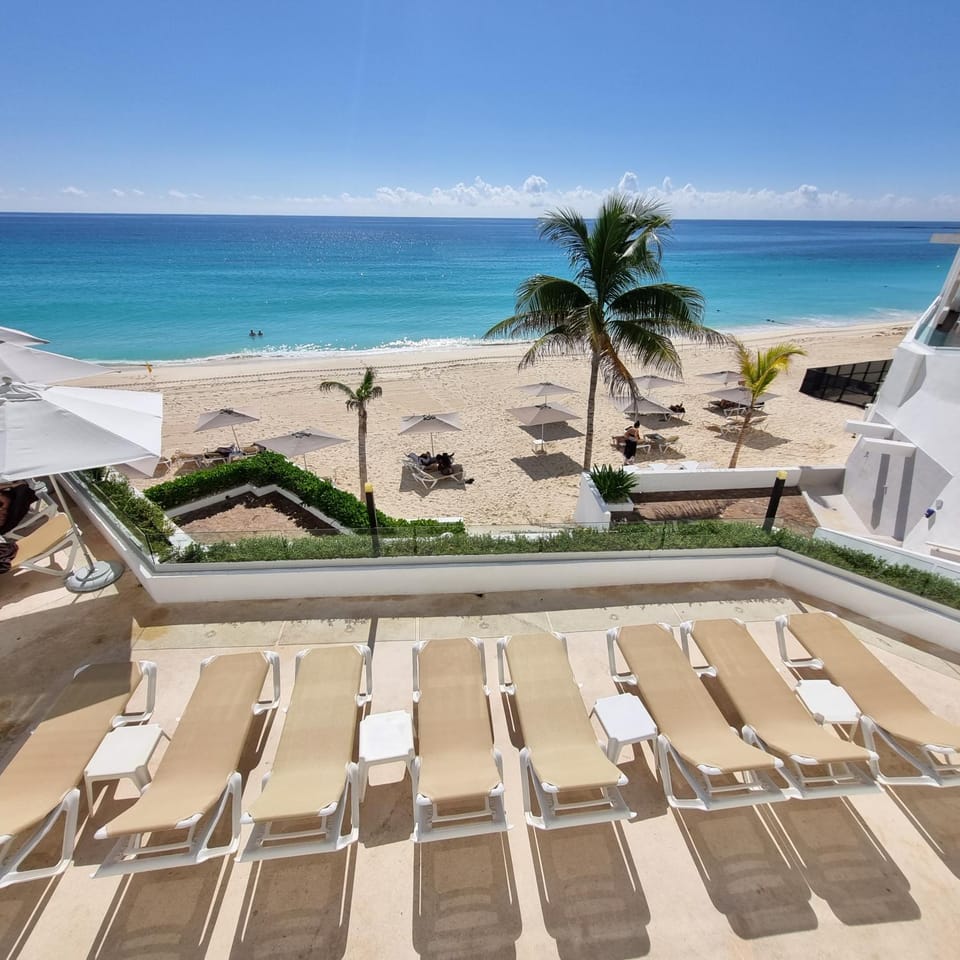 Day, Natural landscape, Beach, Sea view, Swimming pool, sunbed