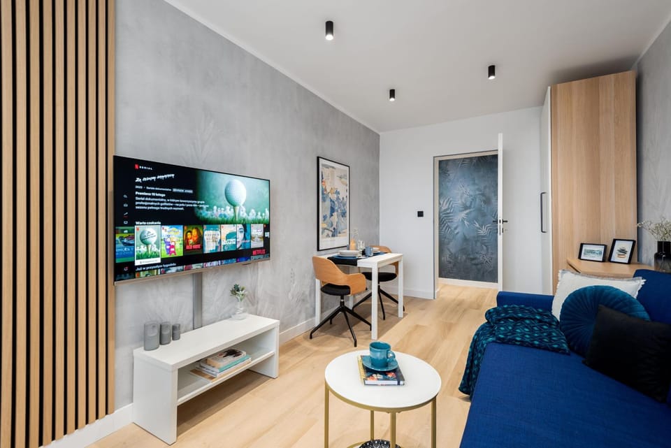 Bed, People, TV and multimedia, View (from property/room), Living room, Decorative detail, Decorative detail, Seating area, Family, furniture, internet, locker, pet friendly, storage, wardrobe, acessibility