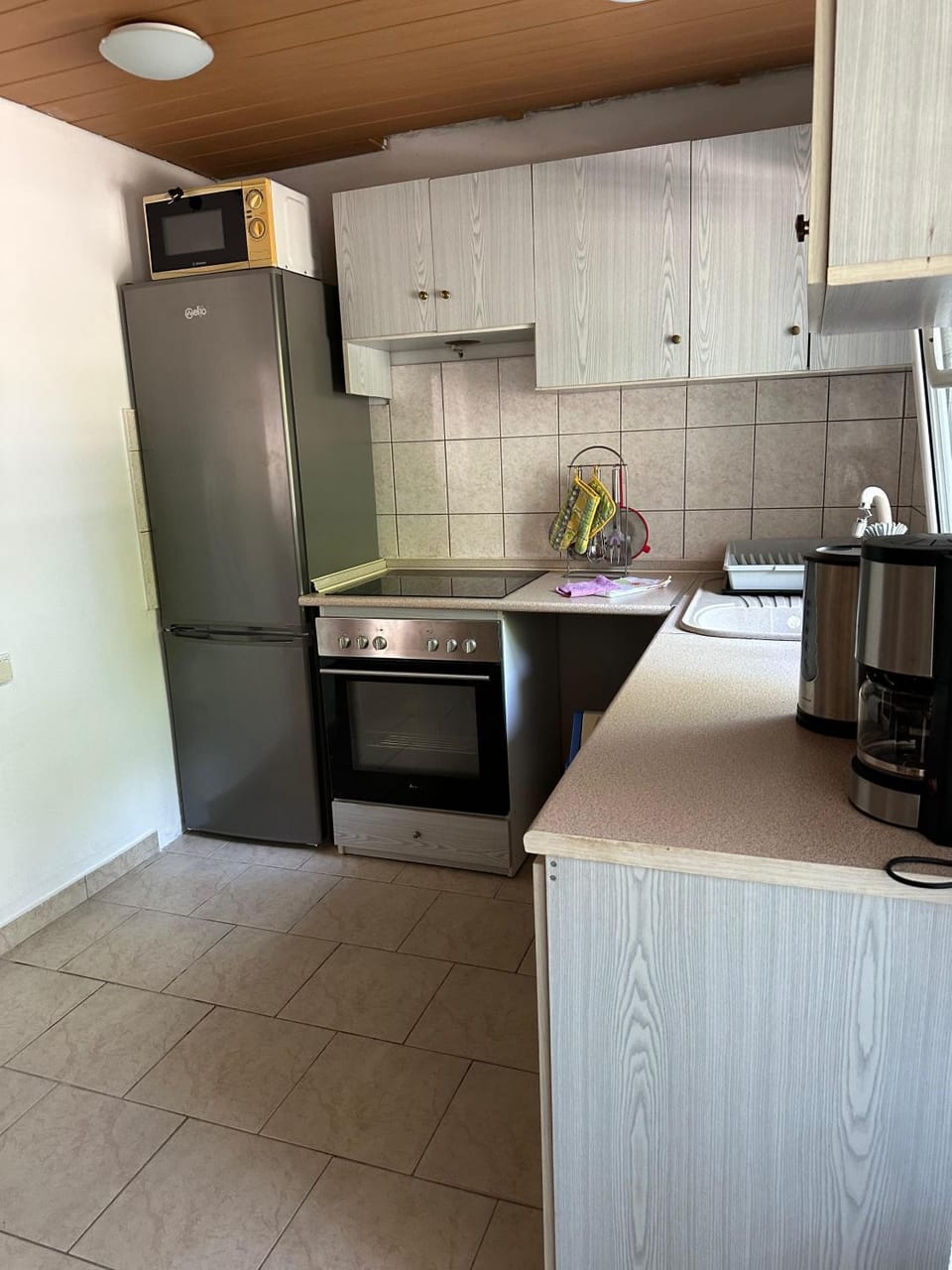 Kitchen or kitchenette, oven, stove