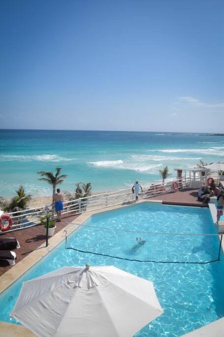 Day, People, Natural landscape, Beach, Sea view, Swimming pool, sunbed