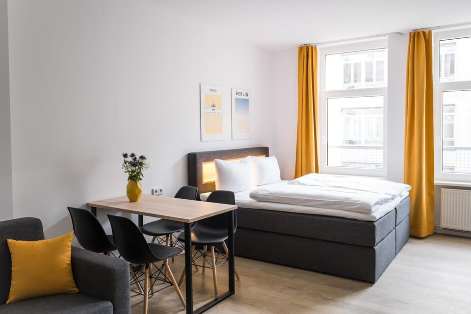 Bed, Living room, Seating area, Dining area, Bedroom