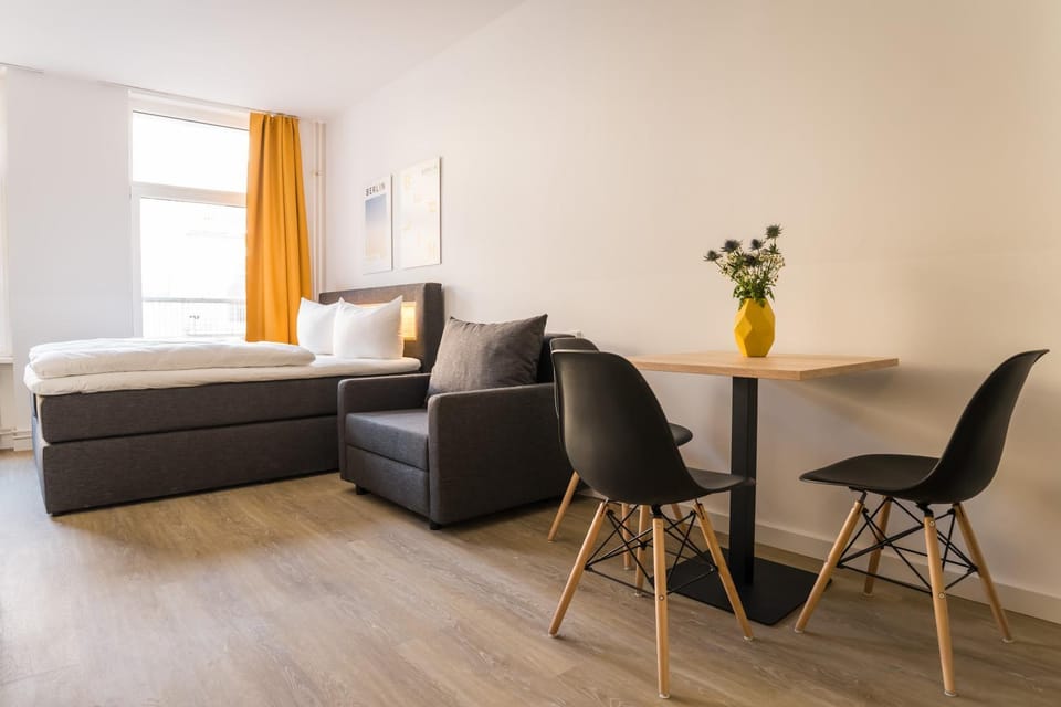 Bed, Living room, Seating area, Dining area, Bedroom