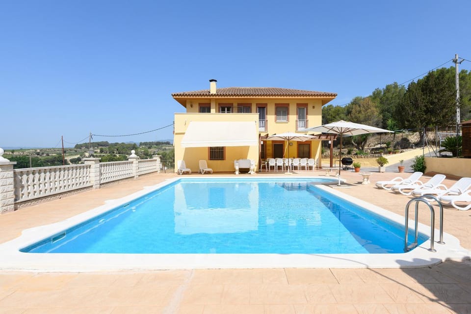Property building, Living room, Swimming pool