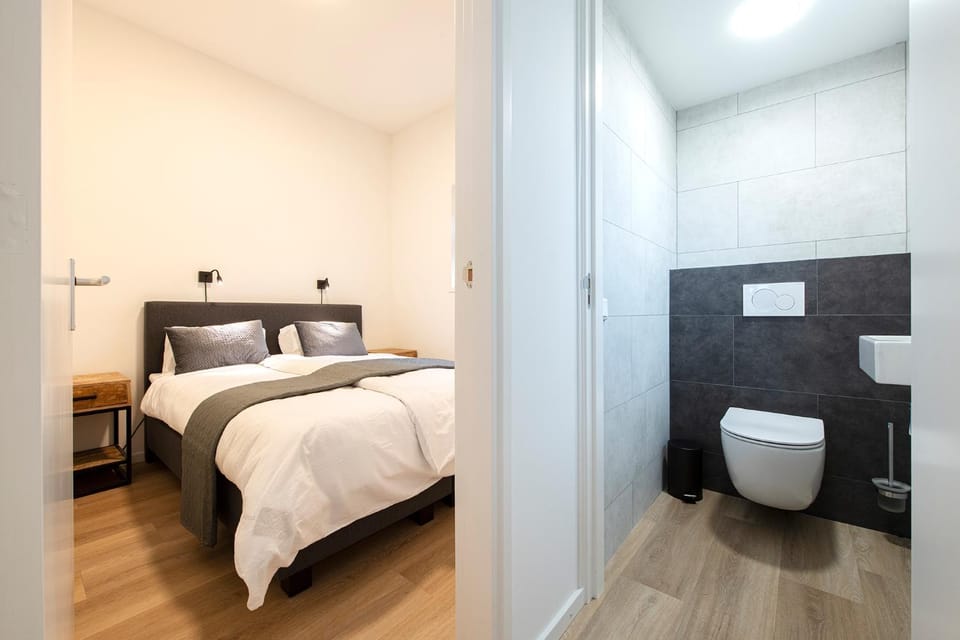 Toilet, Bed, Bathroom, Photo of the whole room, Bedroom