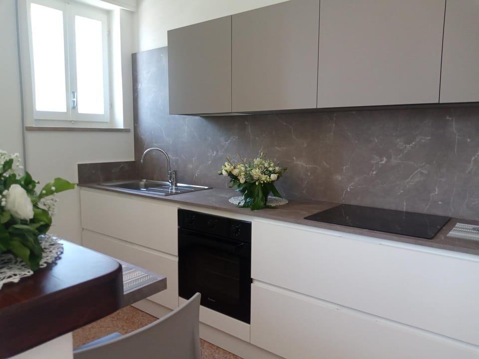 Kitchen or kitchenette, stove