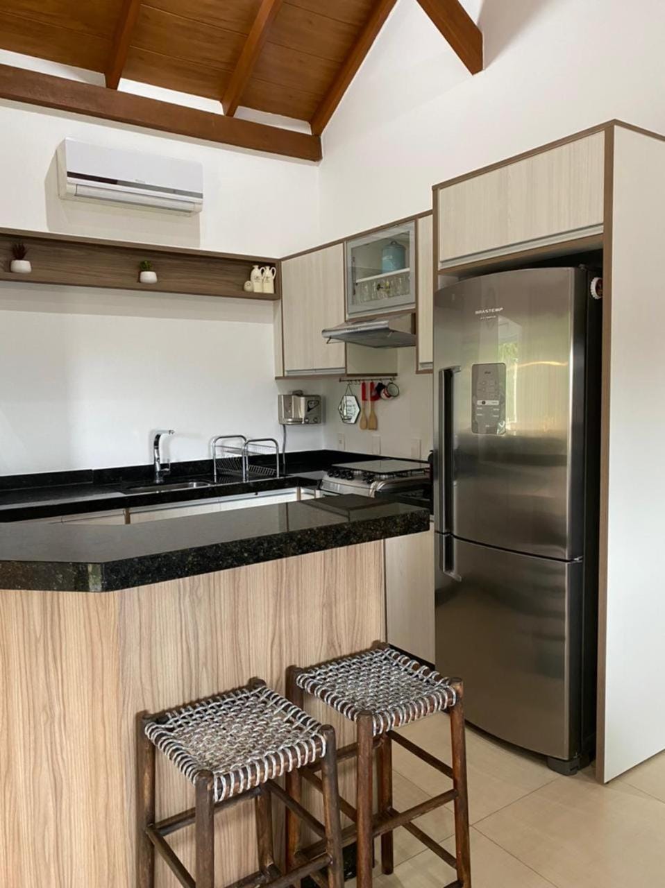 Kitchen or kitchenette, Dining area, stove, air conditioner