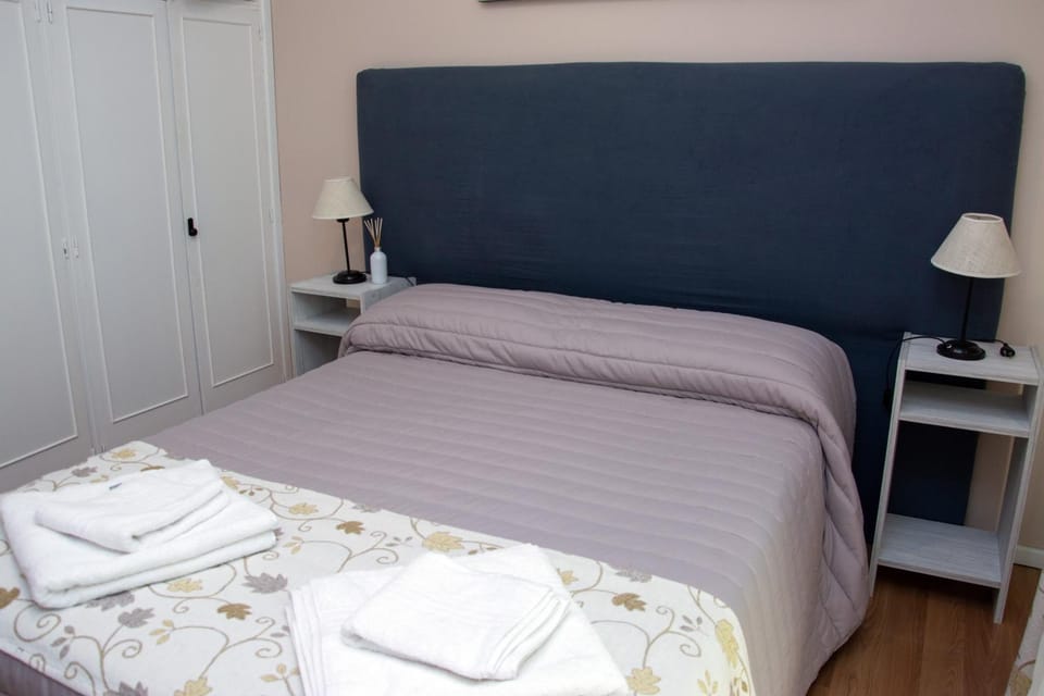 Bed, Photo of the whole room, Bedroom, towels, wardrobe