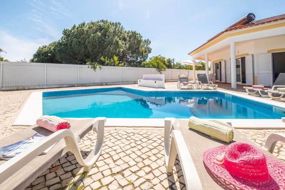 Property building, Patio, Swimming pool, sunbed