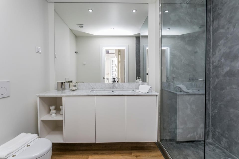 Shower, Toilet, Bathroom, hair dryier, towels