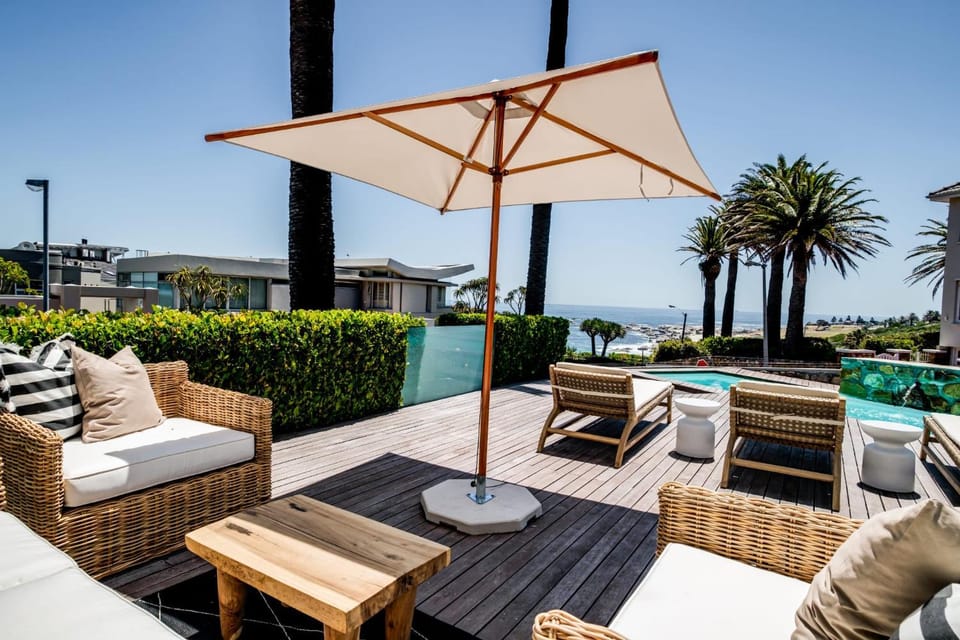 View (from property/room), Balcony/Terrace, Seating area, Sea view, Swimming pool, sunbed