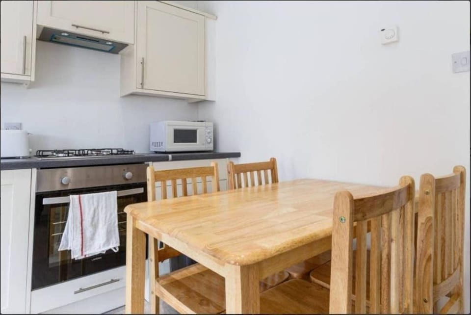 Kitchen or kitchenette, Dining area, oven, stove, toaster