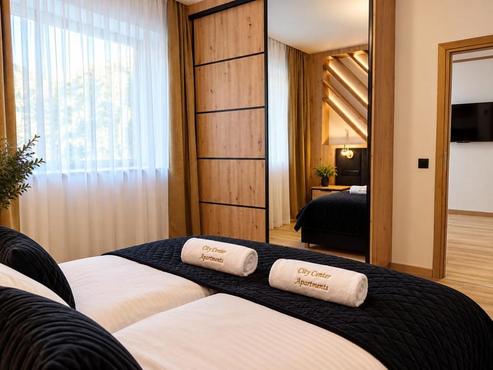 Bed, TV and multimedia, Bedroom, towels, wardrobe