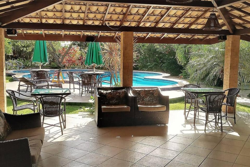 Patio, Day, Garden, Living room, Seating area, Dining area, Garden view, Pool view, Swimming pool