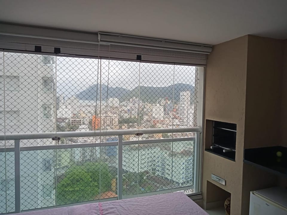 Excelente apartamento em Condomínio na praia das Astúrias Apartment in State of São Paulo